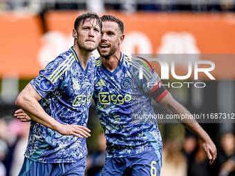 AFC Ajax Amsterdam forward Wout Weghorst and AFC Ajax Amsterdam midfielder Jordan Henderson celebrate the 2-3 goal during the match between...