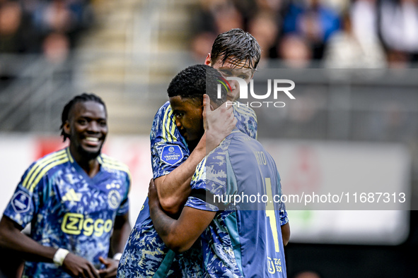 AFC Ajax Amsterdam forward Wout Weghorst and AFC Ajax Amsterdam defender Jorrel Hato celebrate the 2-3 goal during the match between Heracle...