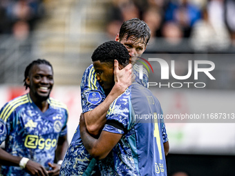 AFC Ajax Amsterdam forward Wout Weghorst and AFC Ajax Amsterdam defender Jorrel Hato celebrate the 2-3 goal during the match between Heracle...