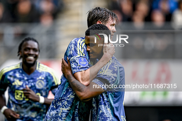 AFC Ajax Amsterdam forward Wout Weghorst and AFC Ajax Amsterdam defender Jorrel Hato celebrate the 2-3 goal during the match between Heracle...