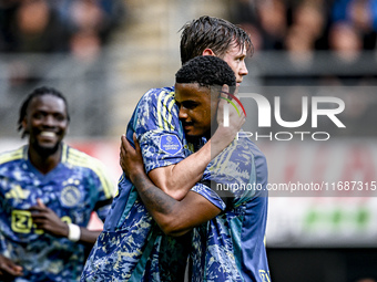 AFC Ajax Amsterdam forward Wout Weghorst and AFC Ajax Amsterdam defender Jorrel Hato celebrate the 2-3 goal during the match between Heracle...