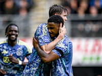 AFC Ajax Amsterdam forward Wout Weghorst and AFC Ajax Amsterdam defender Jorrel Hato celebrate the 2-3 goal during the match between Heracle...