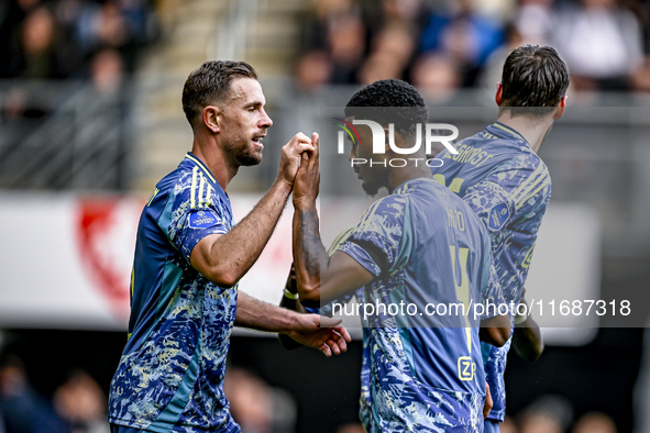 AFC Ajax Amsterdam midfielder Jordan Henderson and AFC Ajax Amsterdam defender Jorrel Hato celebrate the 2-3 goal during the match between H...