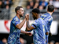 AFC Ajax Amsterdam midfielder Jordan Henderson and AFC Ajax Amsterdam defender Jorrel Hato celebrate the 2-3 goal during the match between H...