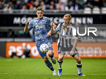 AFC Ajax Amsterdam forward Christian Rasmussen and Heracles Almelo defender Jannes Wieckhof play during the match Heracles Almelo vs. Ajax a...