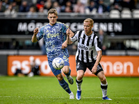 AFC Ajax Amsterdam forward Christian Rasmussen and Heracles Almelo defender Jannes Wieckhof play during the match Heracles Almelo vs. Ajax a...