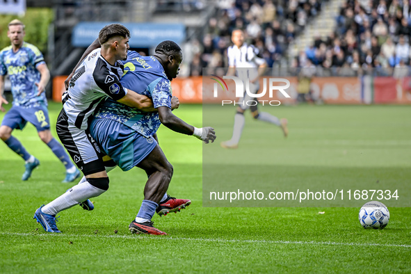 Heracles Almelo defender Ivan Mesik and AFC Ajax Amsterdam forward Brian Brobbey play during the match between Heracles Almelo and Ajax at t...