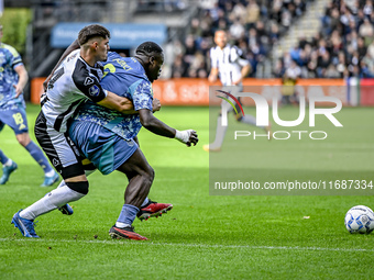 Heracles Almelo defender Ivan Mesik and AFC Ajax Amsterdam forward Brian Brobbey play during the match between Heracles Almelo and Ajax at t...