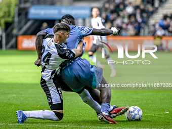 Heracles Almelo defender Ivan Mesik and AFC Ajax Amsterdam forward Brian Brobbey play during the match between Heracles Almelo and Ajax at t...