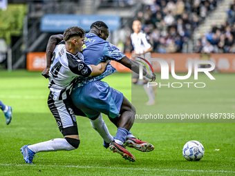 Heracles Almelo defender Ivan Mesik and AFC Ajax Amsterdam forward Brian Brobbey play during the match between Heracles Almelo and Ajax at t...