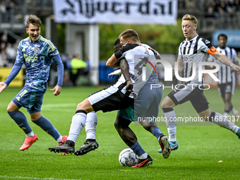 Heracles Almelo defender Damon Mirani and AFC Ajax Amsterdam forward Brian Brobbey participate in the match between Heracles Almelo and Ajax...