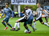 Heracles Almelo defender Damon Mirani and AFC Ajax Amsterdam forward Brian Brobbey participate in the match between Heracles Almelo and Ajax...