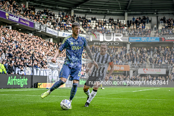 AFC Ajax Amsterdam forward Wout Weghorst and AFC Ajax Amsterdam defender Jorrel Hato participate in the match between Heracles Almelo and Aj...