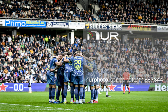 Players of Ajax celebrate the goal by AFC Ajax Amsterdam forward Wout Weghorst, making the score 3-4, during the match between Heracles Alme...