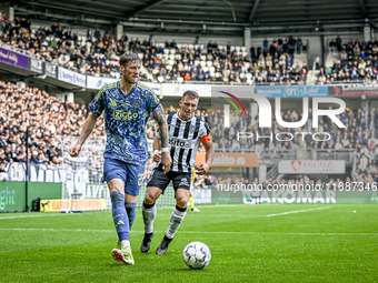 AFC Ajax Amsterdam forward Wout Weghorst and AFC Ajax Amsterdam defender Jorrel Hato participate in the match between Heracles Almelo and Aj...