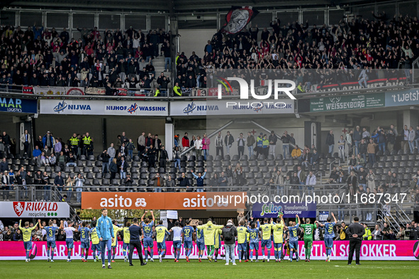 AFC Ajax players celebrate the win with the supporters during the match between Heracles Almelo and Ajax at the Asito Stadium for the Dutch...