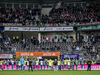 AFC Ajax players celebrate the win with the supporters during the match between Heracles Almelo and Ajax at the Asito Stadium for the Dutch...