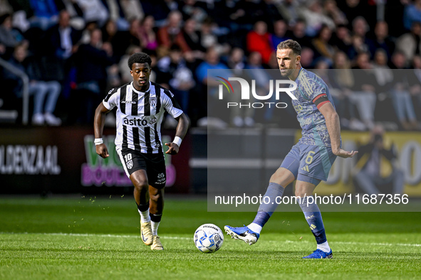 Heracles Almelo midfielder Siloh t Zand and AFC Ajax Amsterdam midfielder Jordan Henderson play during the match between Heracles Almelo and...