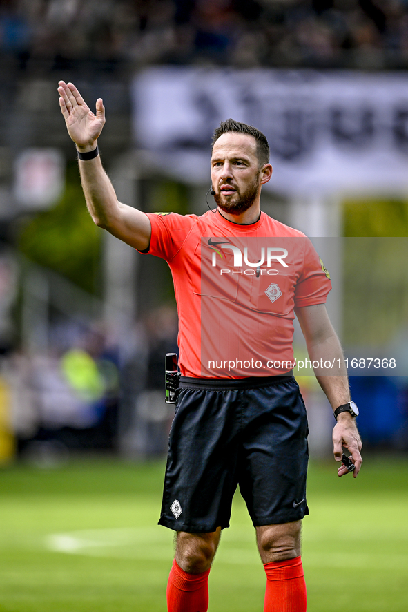 Referee Edwin van de Graaf officiates during the match between Heracles Almelo and Ajax at the Asito Stadium for the Dutch Eredivisie season...