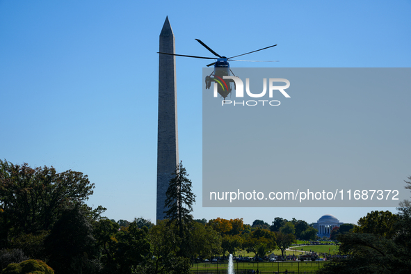 US President Joe Biden walks to the Oval Office after landing on the South Lawn of the White House in Washington, DC, on October 20, 2024, a...