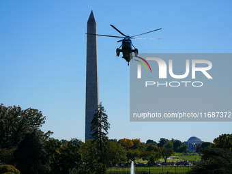 US President Joe Biden walks to the Oval Office after landing on the South Lawn of the White House in Washington, DC, on October 20, 2024, a...