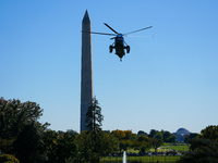 US President Joe Biden walks to the Oval Office after landing on the South Lawn of the White House in Washington, DC, on October 20, 2024, a...