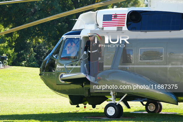 US President Joe Biden walks to the Oval Office after landing on the South Lawn of the White House in Washington, DC, on October 20, 2024, a...