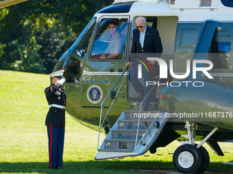 US President Joe Biden walks to the Oval Office after landing on the South Lawn of the White House in Washington, DC, on October 20, 2024, a...