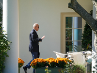 US President Joe Biden walks to the Oval Office after landing on the South Lawn of the White House in Washington, DC, on October 20, 2024, a...