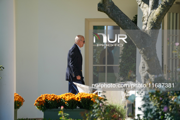 US President Joe Biden walks to the Oval Office after landing on the South Lawn of the White House in Washington, DC, on October 20, 2024, a...