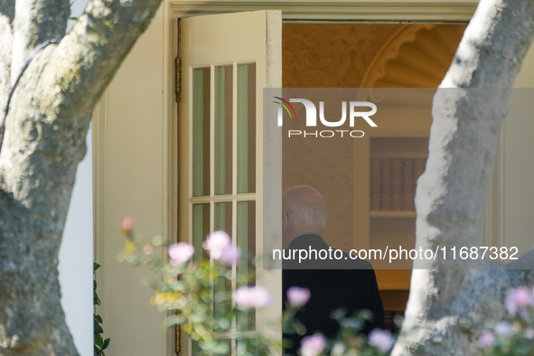 US President Joe Biden walks to the Oval Office after landing on the South Lawn of the White House in Washington, DC, on October 20, 2024, a...