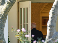 US President Joe Biden walks to the Oval Office after landing on the South Lawn of the White House in Washington, DC, on October 20, 2024, a...