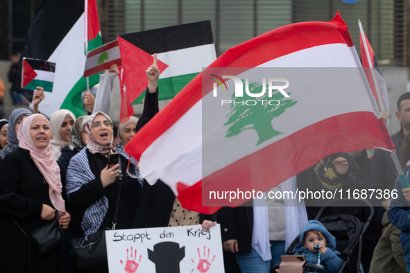 A hundred pro-Palestinian activists take part in a weekly demonstration in front of the Dom Cathedral  in Cologne, Germany, on October 20, 2...