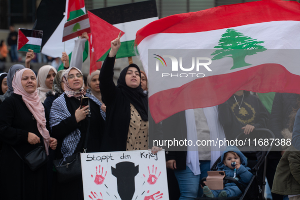 A hundred pro-Palestinian activists take part in a weekly demonstration in front of the Dom Cathedral  in Cologne, Germany, on October 20, 2...