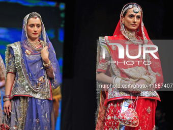 Models walk the ramp showcasing a designer collection during the 'Shaadiyan' season-5 fashion show in Jaipur, Rajasthan, India, on October 1...