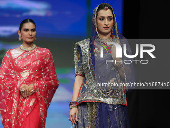 Models walk the ramp showcasing a designer collection during the 'Shaadiyan' season-5 fashion show in Jaipur, Rajasthan, India, on October 1...