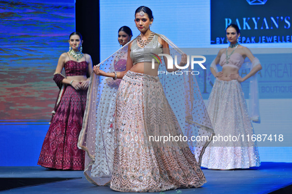 Models walk the ramp showcasing a designer collection during the 'Shaadiyan' season-5 fashion show in Jaipur, Rajasthan, India, on October 1...