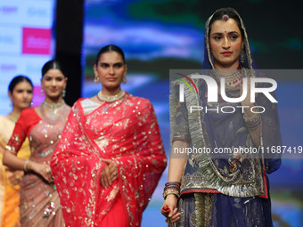 Models walk the ramp showcasing a designer collection during the 'Shaadiyan' season-5 fashion show in Jaipur, Rajasthan, India, on October 1...