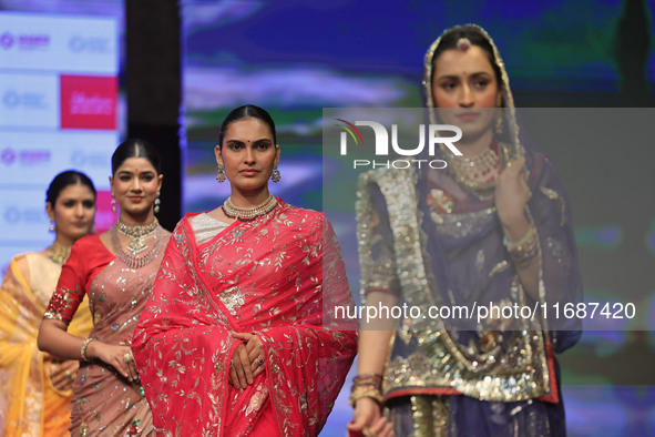 Models walk the ramp showcasing a designer collection during the 'Shaadiyan' season-5 fashion show in Jaipur, Rajasthan, India, on October 1...