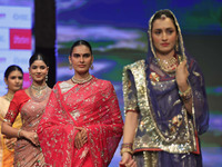 Models walk the ramp showcasing a designer collection during the 'Shaadiyan' season-5 fashion show in Jaipur, Rajasthan, India, on October 1...