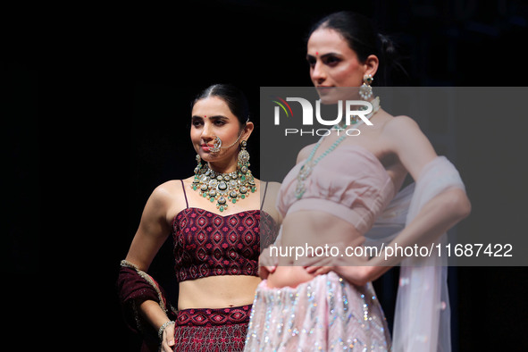 Models walk the ramp showcasing a designer collection during the 'Shaadiyan' season-5 fashion show in Jaipur, Rajasthan, India, on October 1...