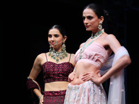 Models walk the ramp showcasing a designer collection during the 'Shaadiyan' season-5 fashion show in Jaipur, Rajasthan, India, on October 1...