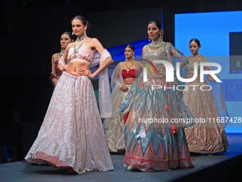 Models walk the ramp showcasing a designer collection during the 'Shaadiyan' season-5 fashion show in Jaipur, Rajasthan, India, on October 1...