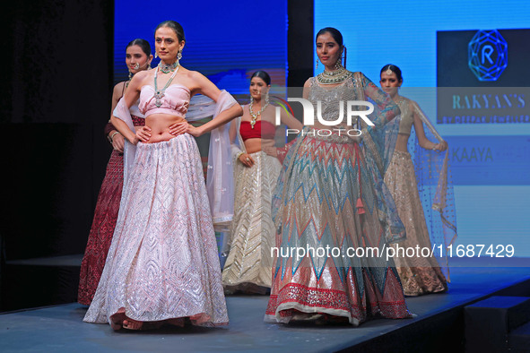 Models walk the ramp showcasing a designer collection during the 'Shaadiyan' season-5 fashion show in Jaipur, Rajasthan, India, on October 1...