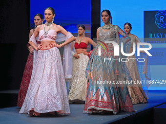 Models walk the ramp showcasing a designer collection during the 'Shaadiyan' season-5 fashion show in Jaipur, Rajasthan, India, on October 1...