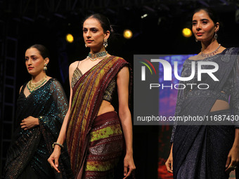 Models walk the ramp showcasing a designer collection during the 'Shaadiyan' season-5 fashion show in Jaipur, Rajasthan, India, on October 1...