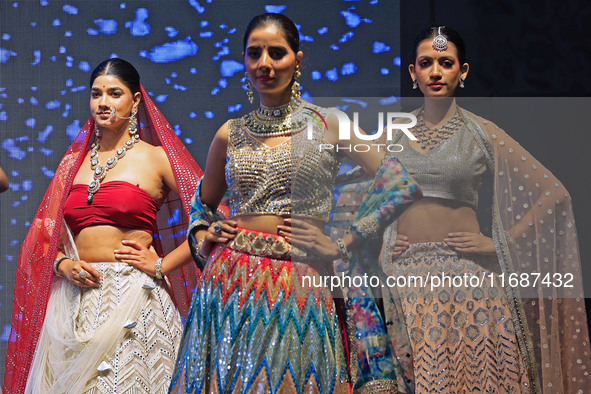 Models walk the ramp showcasing a designer collection during the 'Shaadiyan' season-5 fashion show in Jaipur, Rajasthan, India, on October 1...