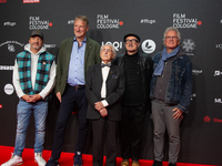 Dr. Leon Weintraub, the Holocaust survivor, Michael Souvignier, the producer of the film, and film crews are on the red carpet of the photoc...