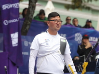 Kim Woojin of Korea competes against Matias Grande of Mexico (not in picture) during the Men's recurve semifinals match on the final day of...