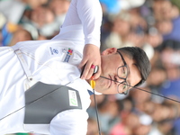 Kim Woojin of Korea competes against Matias Grande of Mexico (not in picture) during the Men's recurve semifinals match on the final day of...